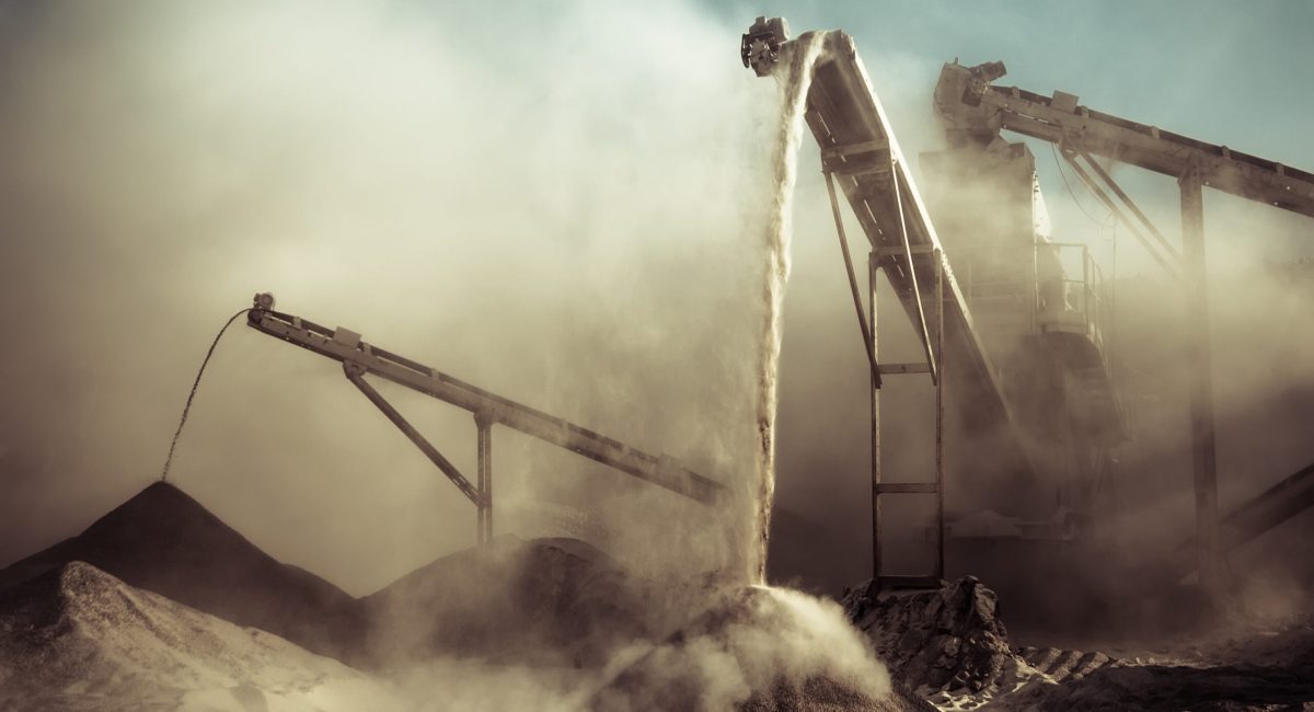 Industrial background with working gravel crusher